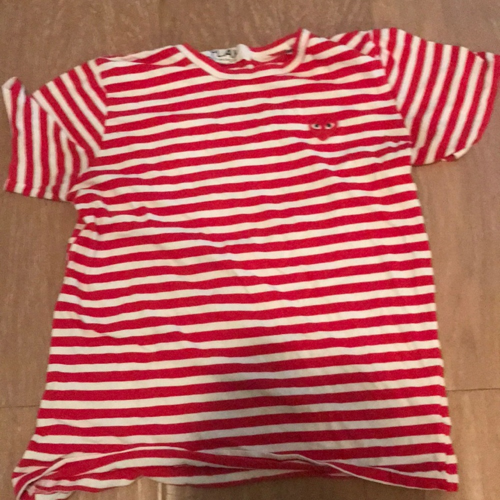 A men white and red striped CDG shirt